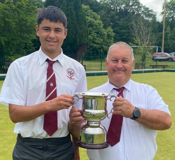 Harvey and grandad show their bowls trophy